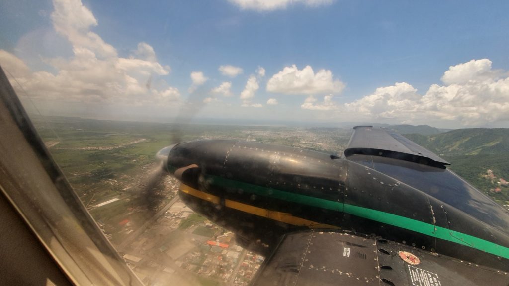 View from the wing of a turboprop in Trinidad