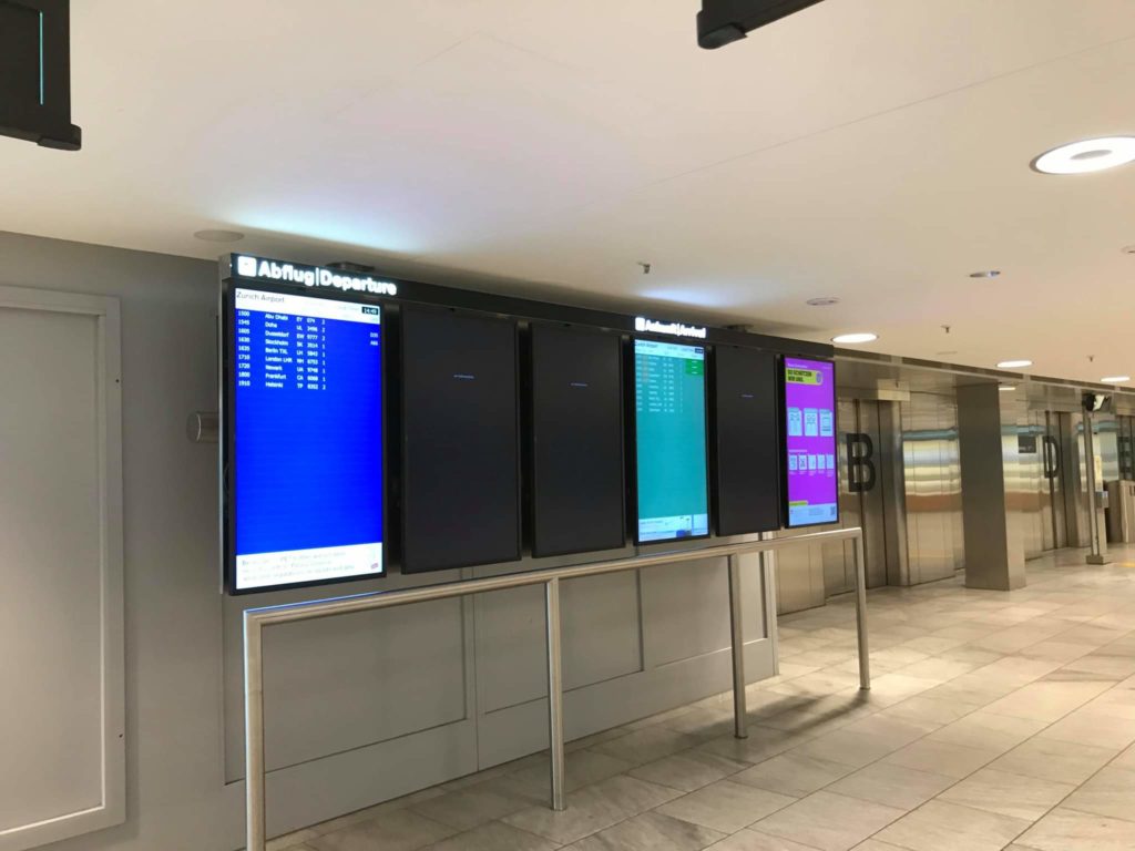 An empty airport departures board at Zurich Airport during the pandemic